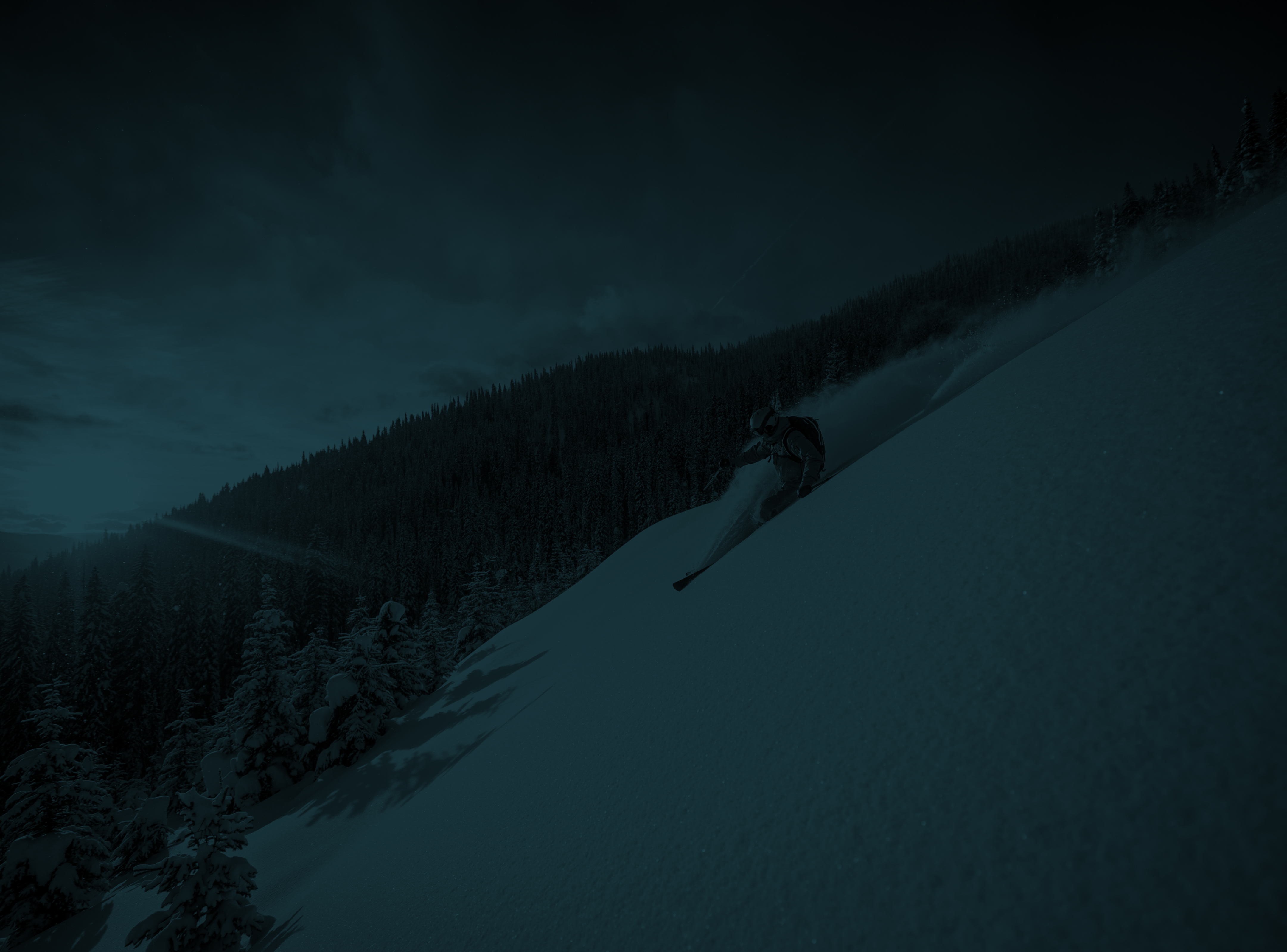 Skiier Sking down mountain in Telluride Colorado